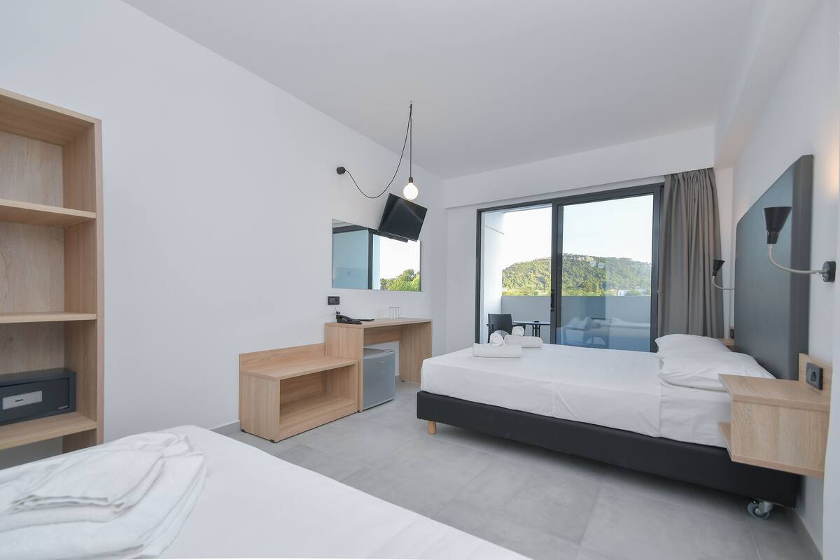 Chambre Standard Double ou avec lits jumeaux | Espace de travail pour ordinateur portable, Wi-Fi gratuit, draps fournis