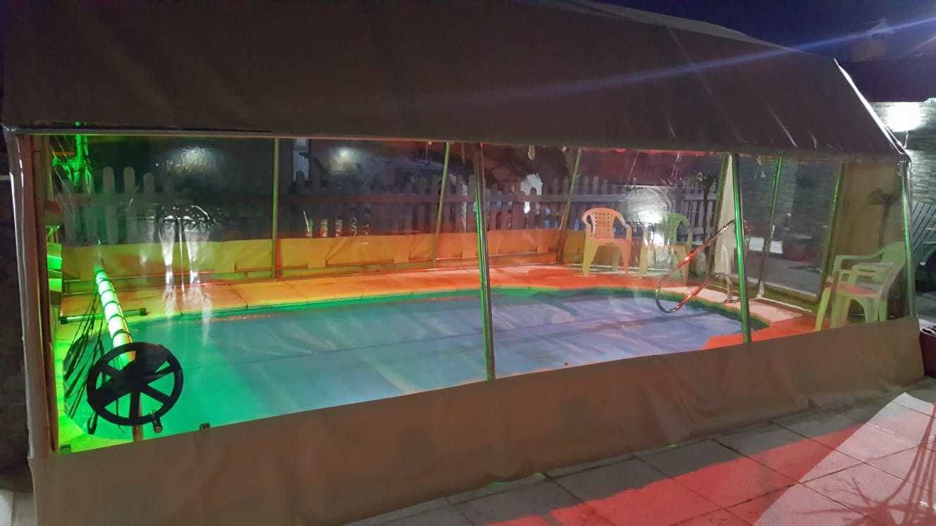 Indoor pool, open 10:00 AM to 11:00 PM, pool umbrellas