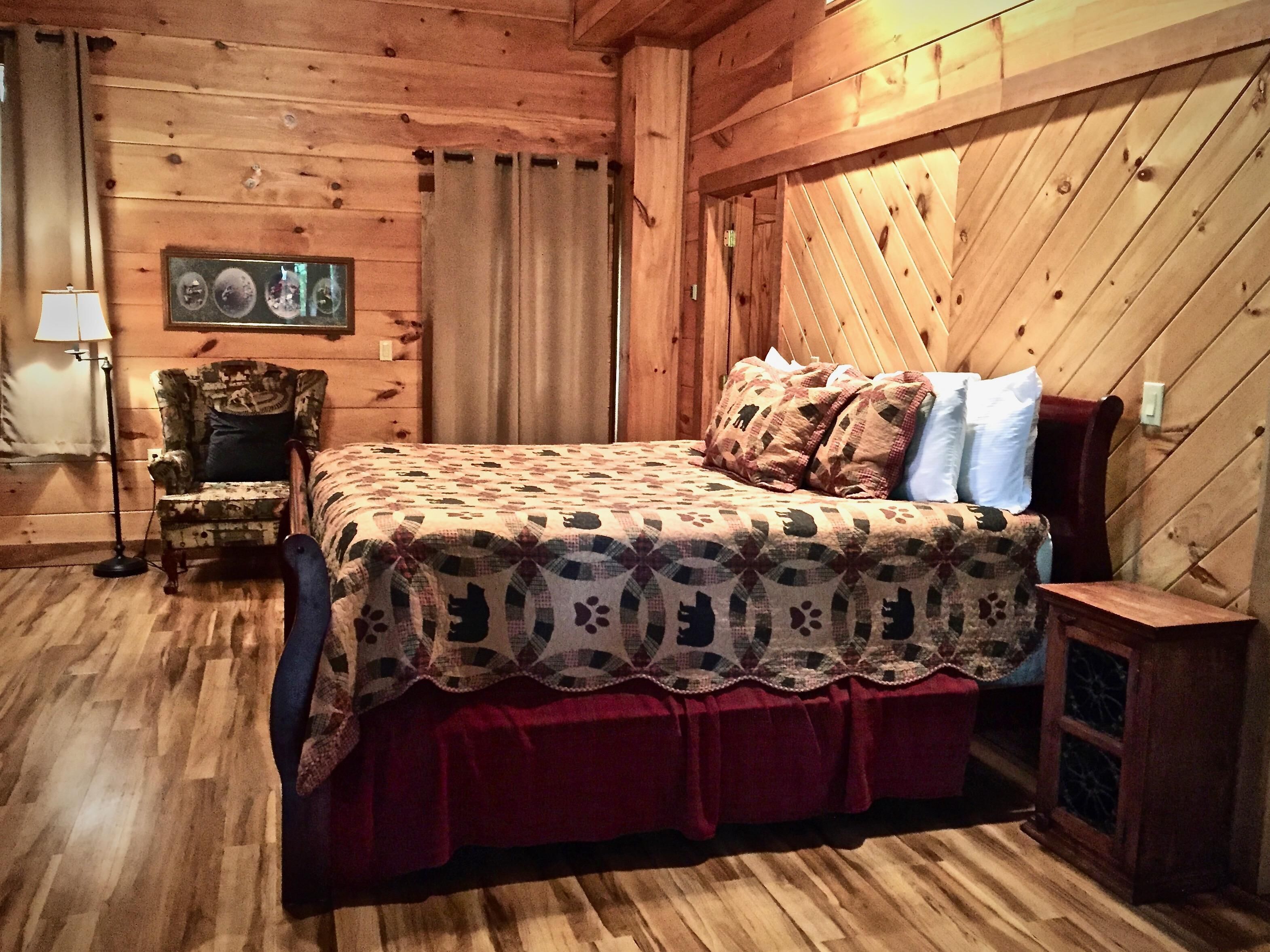 King Suite offers a third Flat Screen TV, access to the Hot Tub Deck, Fire Pit, Media Room