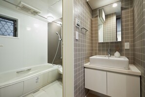 Hair dryer, slippers, towels