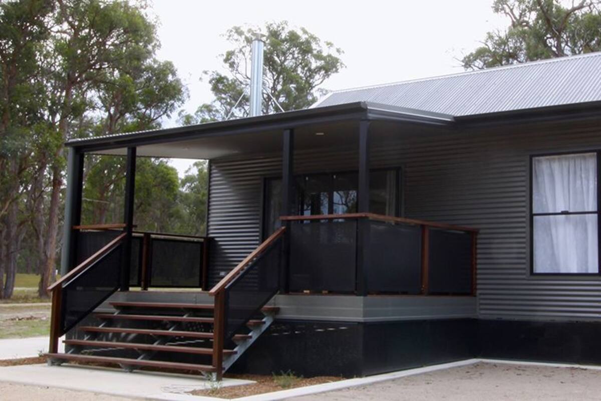 Exclusive Cabin, 1 Bedroom, Lake View | Premium bedding, pillowtop beds, blackout drapes, iron/ironing board