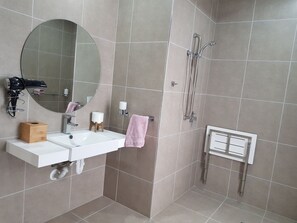 Studio, 1 Queen Bed, Accessible, Lake View | Bathroom | Designer toiletries, hair dryer, towels, soap