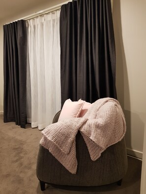 Premium bedding, pillowtop beds, blackout drapes, iron/ironing board