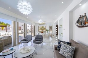 Villa | Living area | Flat-screen TV - Protaras Sunrise Beach Villa (Paralimni)