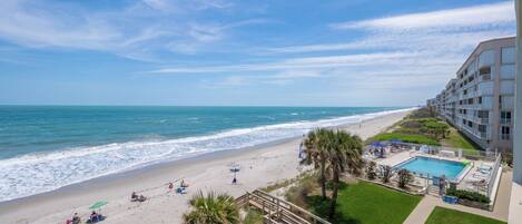 On the beach, sun-loungers, beach towels