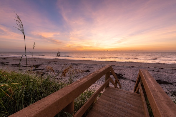 On the beach, sun loungers, beach towels