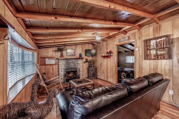 TV, fireplace, DVD player, video library - Knotty Pine | Upper Canyon Cabin • Hot Tub (Ruidoso)