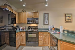 Fridge, microwave, stovetop, coffee/tea maker