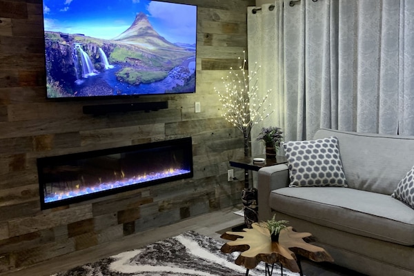 Lighted Spruce Tree is set up in Condo during the Holiday Season.