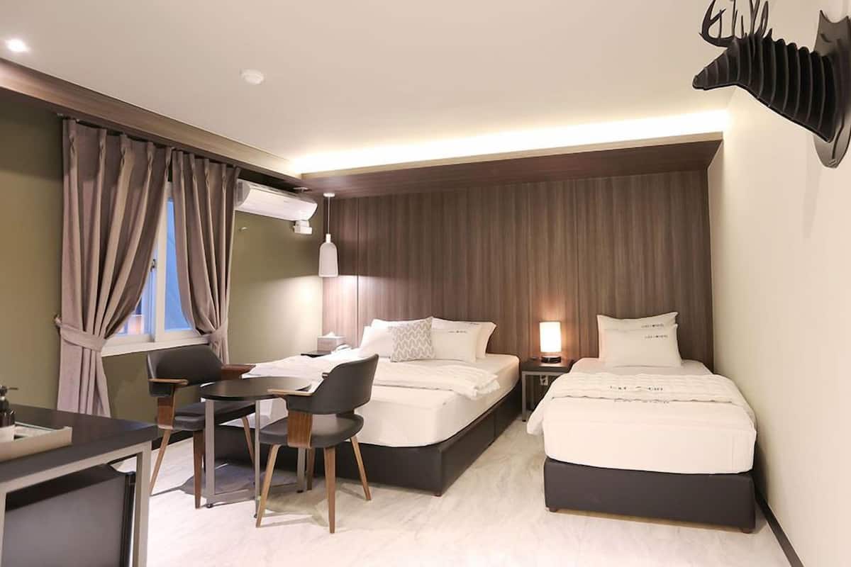 Royal Twin Room | Laptop workspace, blackout drapes, WiFi (free), individually decorated