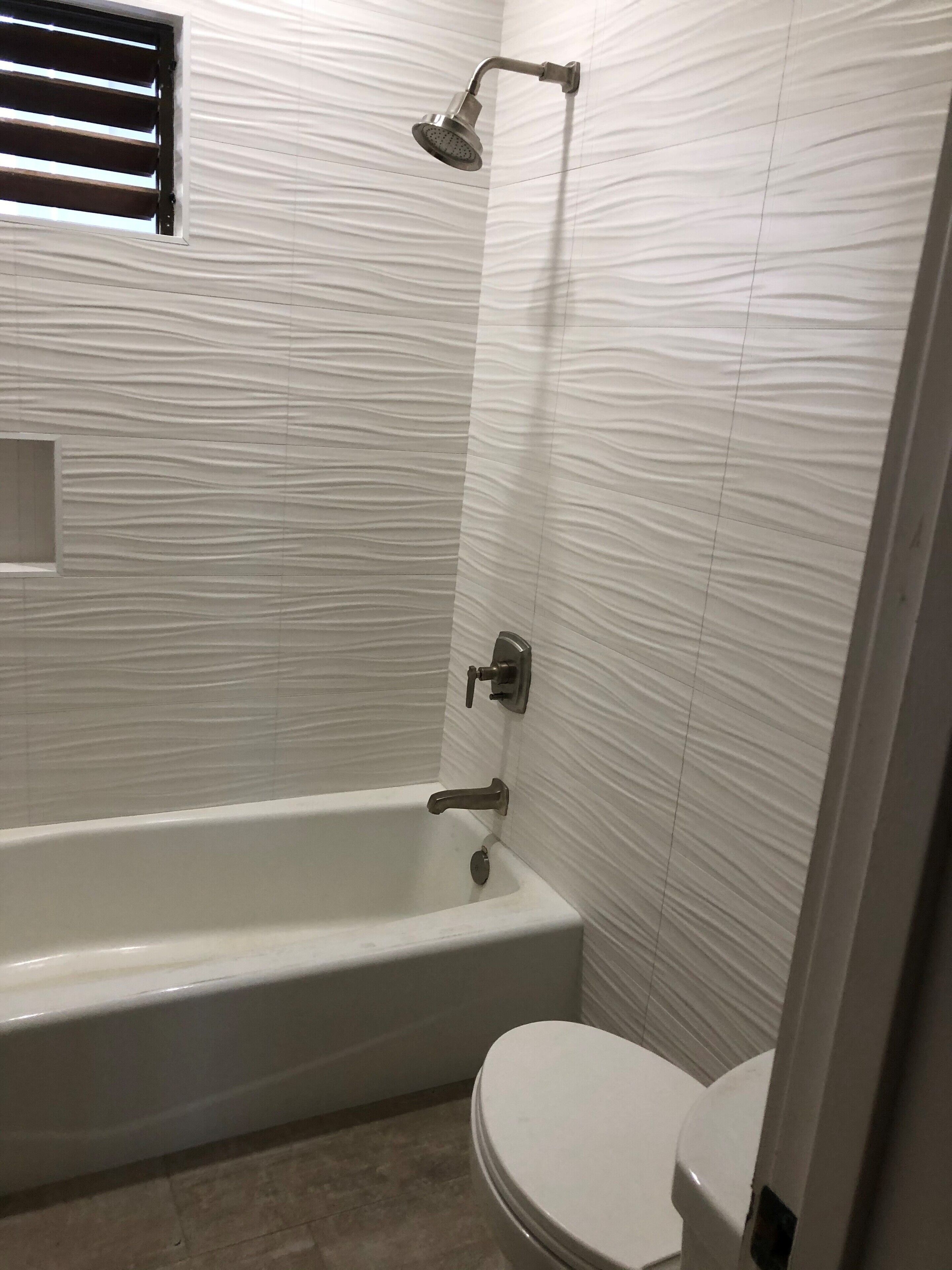 Bathtub, hair dryer, towels, soap