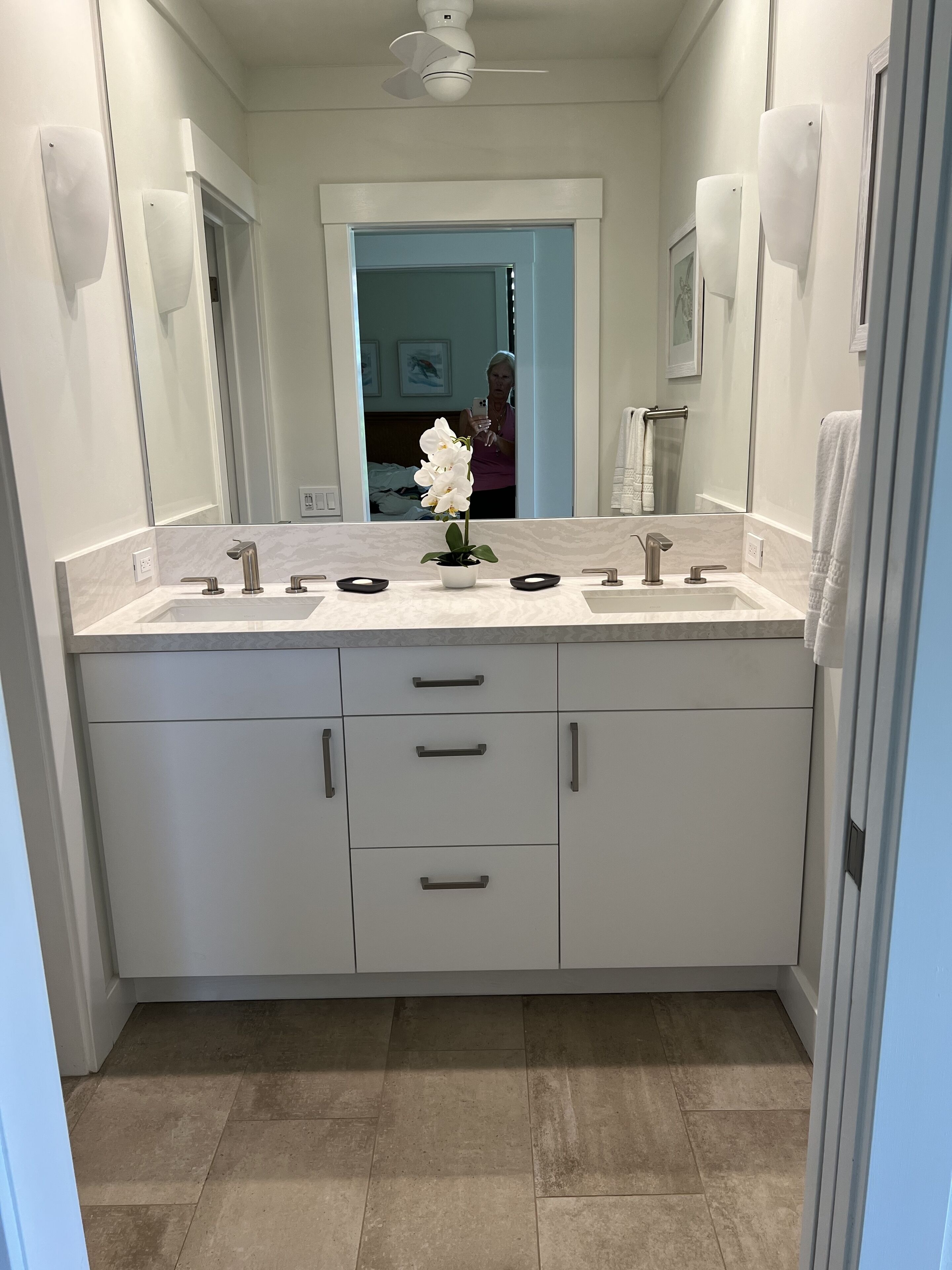 Bathtub, hair dryer, towels, soap