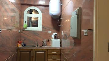 Family Villa, 4 Bedrooms | Private kitchen | Full-sized fridge, microwave, oven, stovetop