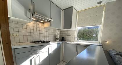 Vacation home with enclosed garden near the beach and lake.