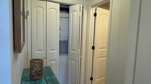 Laundry closet - apartment size washer/dryer -supplies (pods, dry sheets, iron)