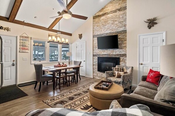 Smart TV, fireplace, books, offices