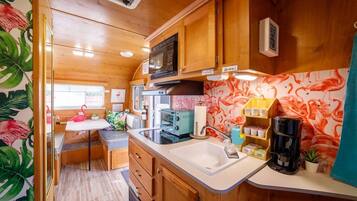 Fridge, microwave, stovetop, coffee/tea maker