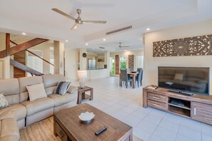 Luxury Villa, Golf View | Living area | 55-inch LED TV with satellite channels, TV, Netflix - Paradise Links Port Douglas Luxury Villa (Craiglie)