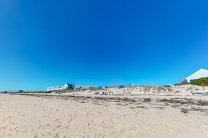 Stunning coastal views from the modern buildings overlooking the pristine beach.