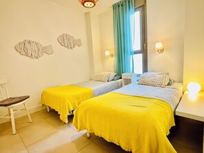 2 bedrooms, desk, iron/ironing board, travel crib