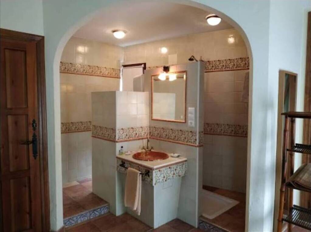 Shower, hair dryer, towels, toilet paper