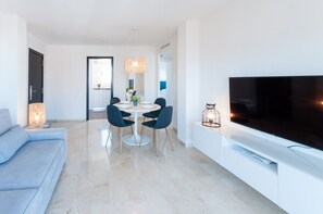 TV - Lovely apartment, very close to the beach. Wi-Fi A / C With terrace - only families (Playa de Gandía)