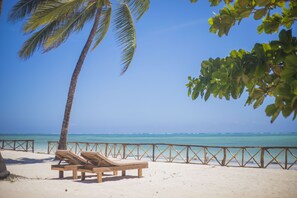 Private beach nearby, white sand, sun-loungers, beach bar