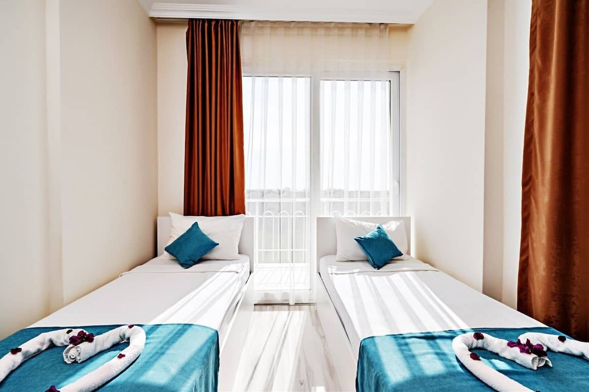 Suite familiar | 1 dormitorio, escritorio, espacio para trabajar con un portátil