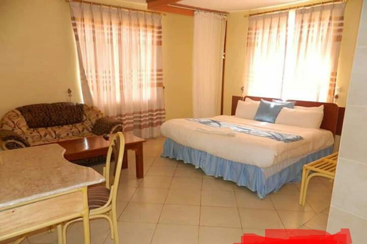 Premium bedding, memory foam beds, desk, laptop workspace