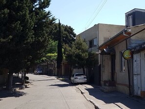 Stroll along the quiet street lined with charming buildings.