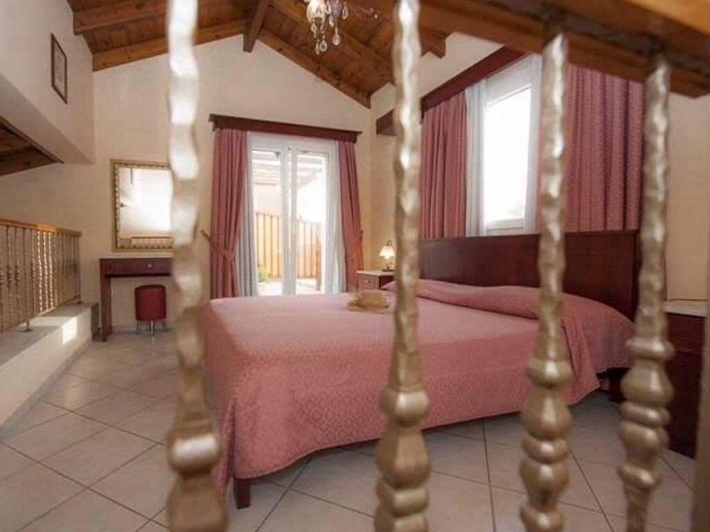 Family Duplex, Multiple Beds, Garden View | 1 bedroom, in-room safe, individually decorated, blackout drapes