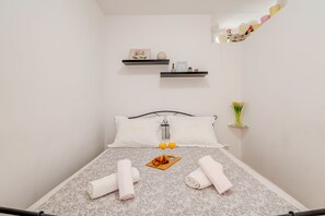 Apartamento | 1 quarto, frigobar, Wi-Fi de cortesia, roupa de cama