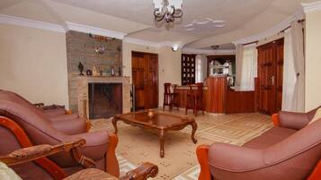 Family House, 5 Bedrooms | Living area | 42-inch flat-screen TV with premium TV channels, LED TV