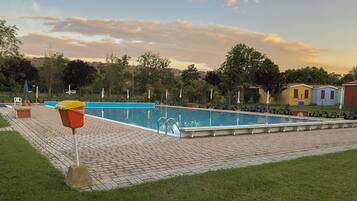 Seasonal outdoor pool, pool umbrellas, sun loungers