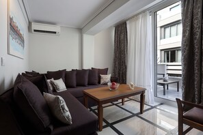 Penthouse | Living area | Flat-screen TV