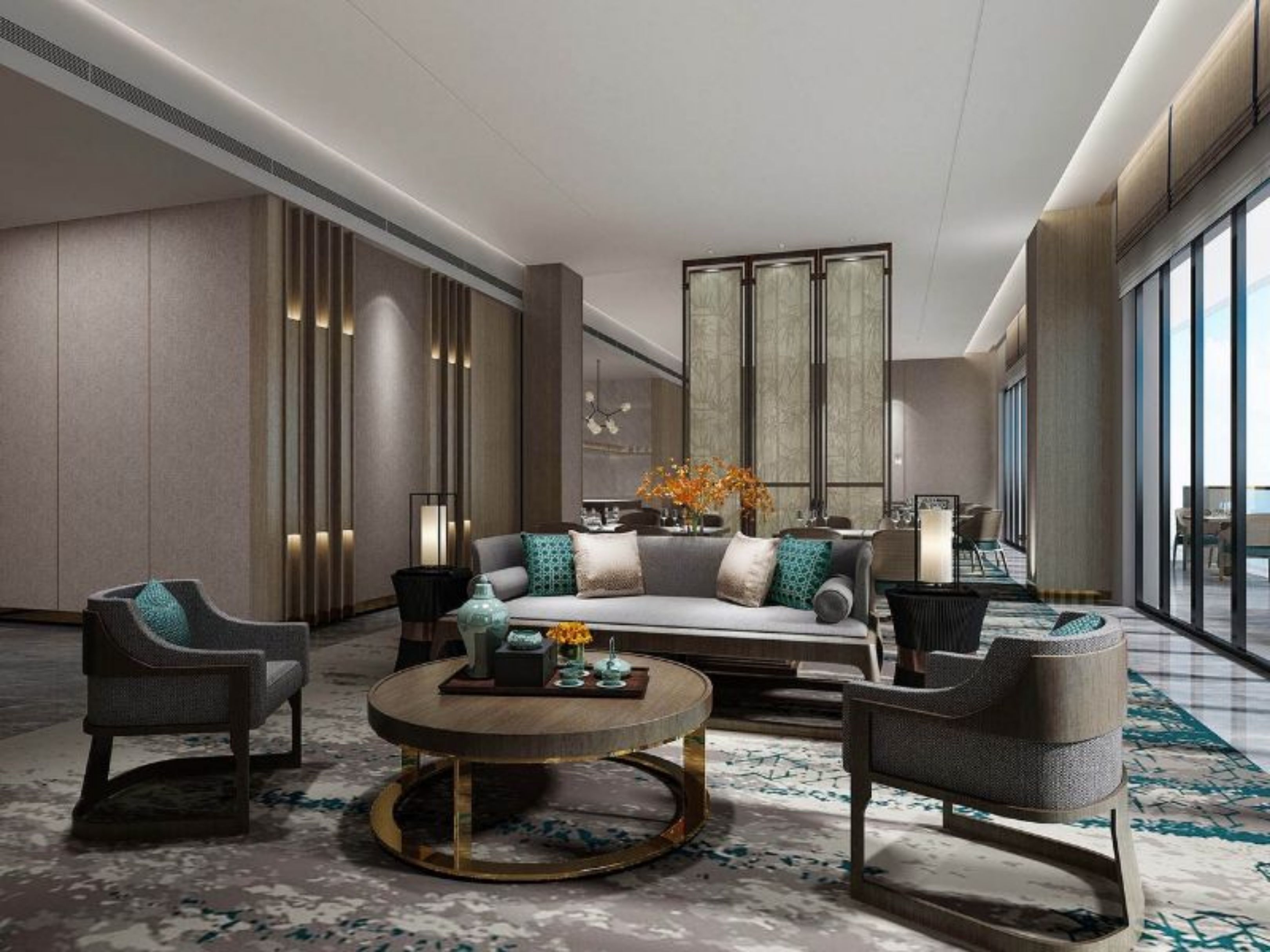 Un moderno vestíbulo de hotel con un conjunto de sofás, dos sillones, una mesa de centro y un jarrón decorativo.