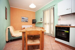 Appartement, 1 chambre | Coin séjour | Télévision LCD