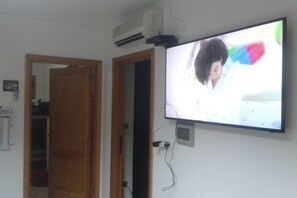 Apartment, 3 Bedrooms | Television - Villetta Budoni Summer (Budoni)
