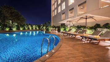 Outdoor pool, pool umbrellas, pool loungers