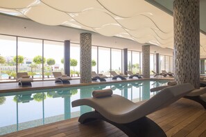 3 indoor pools, outdoor pool, open 9:00 AM to 7:00 PM, pool umbrellas