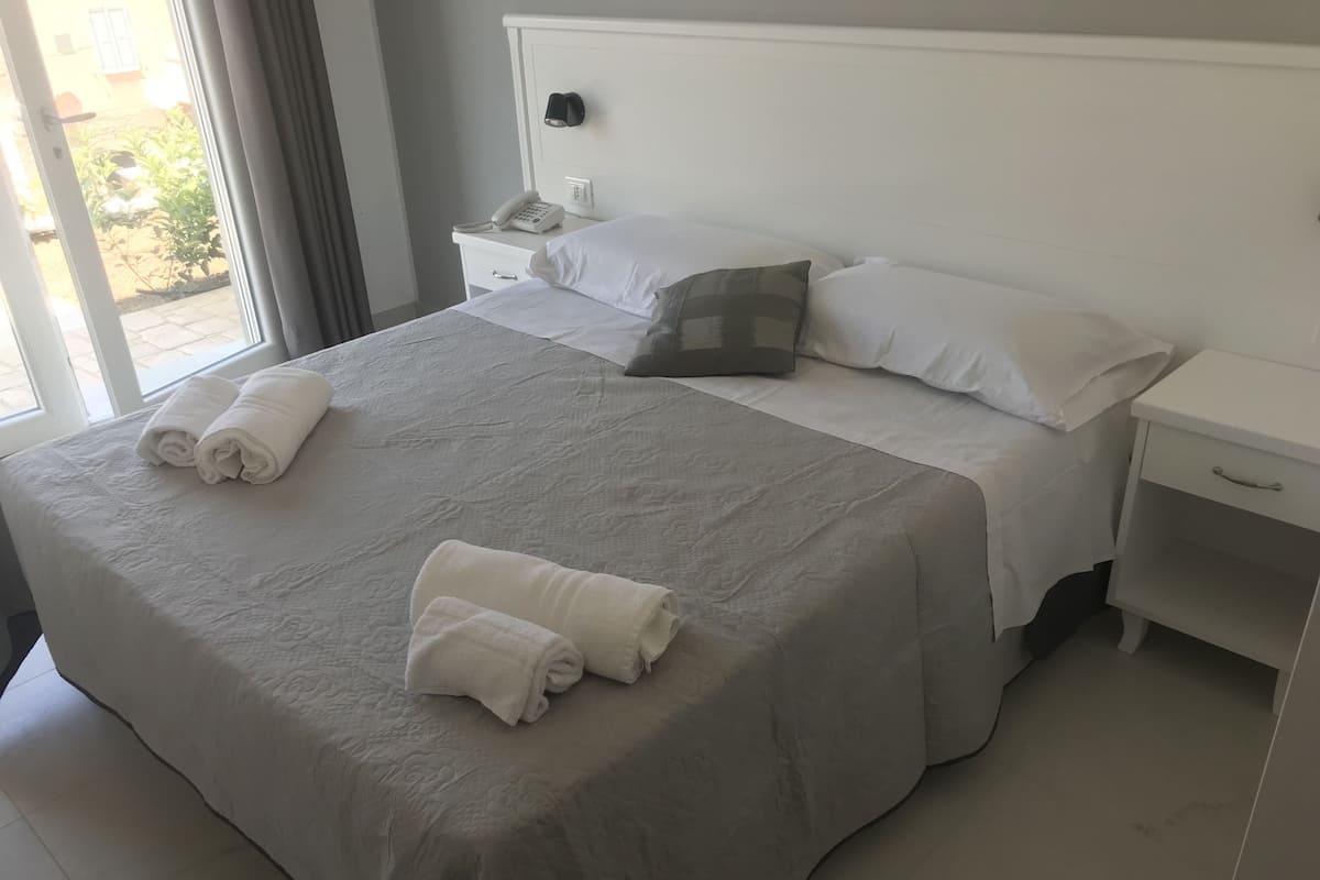Family Room, 1 Bedroom | In-room safe, soundproofing, free WiFi