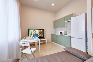 Apartment | Private kitchen | Full-size fridge, microwave, stovetop, electric kettle - Flatsis Apartment Potebni 4 (Kharkiv)