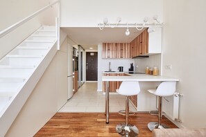 Apartment (Fleur-de-Lys) | Private kitchen | Full-sized fridge, microwave, stovetop, electric kettle - Flatsis Apartment Dudinskaya 1A (Kharkiv)