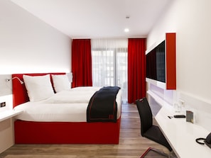 Literie hypoallergénique, mini-bar avec articles gratuits