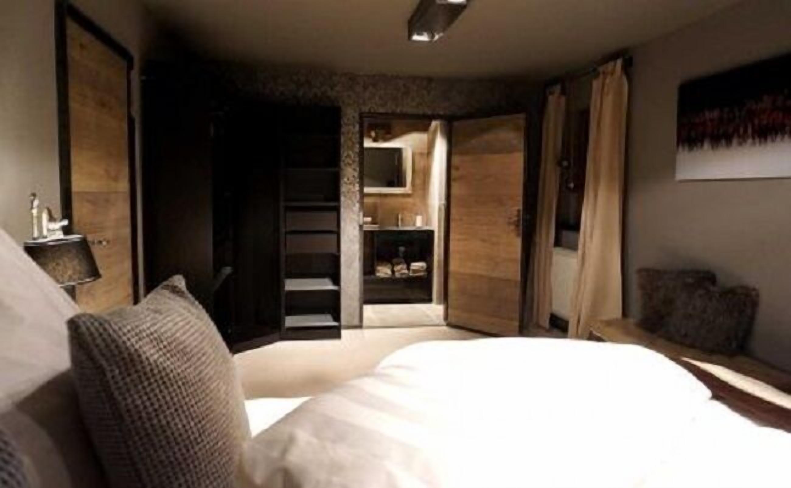 Exclusive Chalet | Egyptian cotton sheets, premium bedding, down comforters, in-room safe