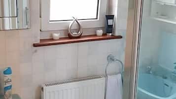 Shower, free toiletries, hair dryer, towels