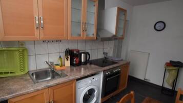Apartment | Private kitchen | Fridge, oven, stovetop, coffee/tea maker