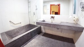 Suite | Bathroom | Free toiletries, hair dryer, bathrobes, slippers