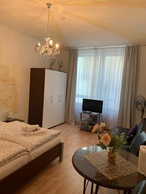 Coffres-forts dans les chambres, fer et planche à repasser