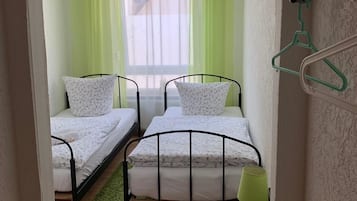 Twin Room (7 - no shower) | 1 bedroom, in-room safe, iron/ironing board, cots/infant beds